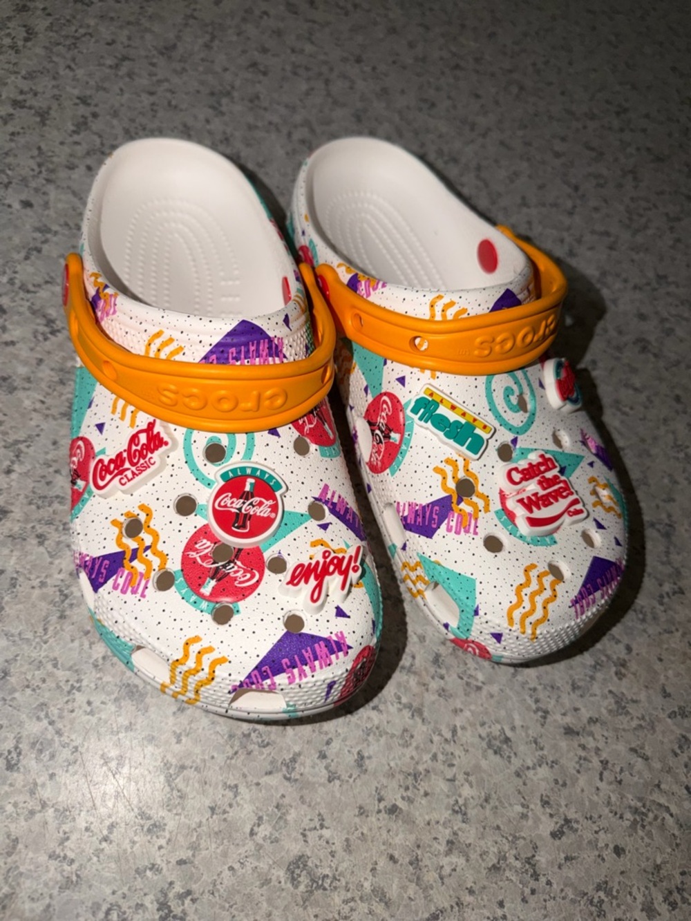 CROCS White Graphic Clogs with Orange Heel Strap